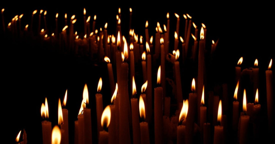 Lit candles in a church