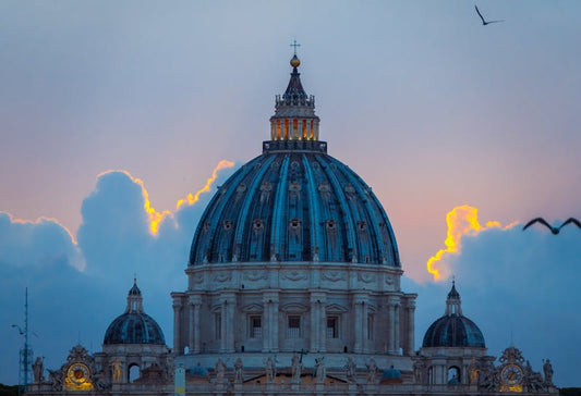 St Peters Basilica at sunset Rome - Catholic pilgrimage guide - Catholically