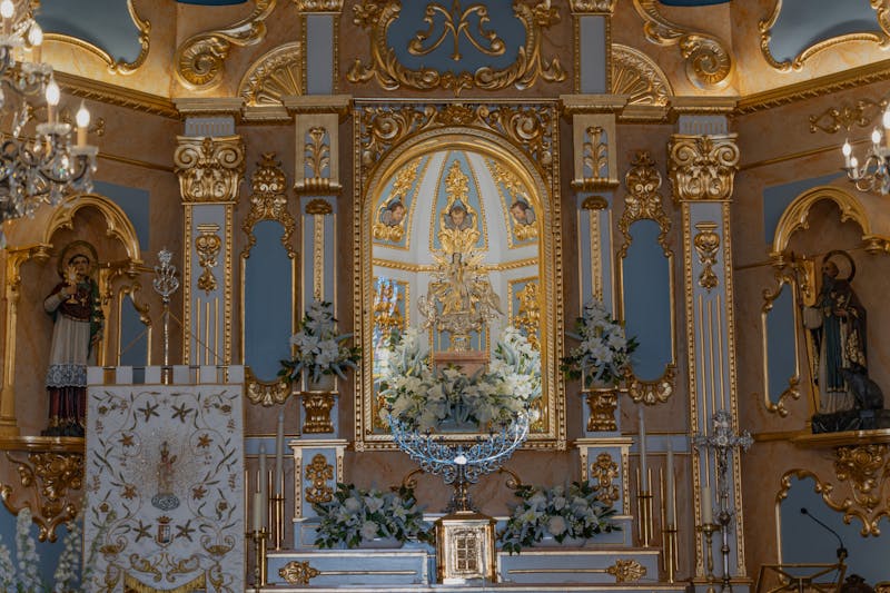 Catholic church interior with relics and sacred art - Catholically