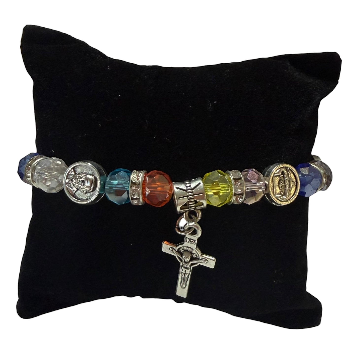 Catholically St. Benedict bracelet with multi-color crystal beads and silver crucifix charm. 7" length.