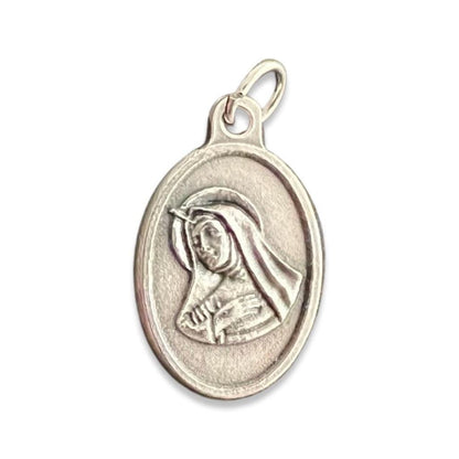 St. Rita Relic Medal - Patron of infertility and parenthood | Catholically