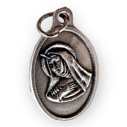 St. Rita Relic Medal - Patron of infertility and parenthood | Catholically