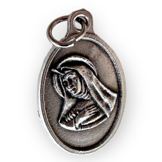 St. Rita Relic Medal - Patron of infertility and parenthood | Catholically